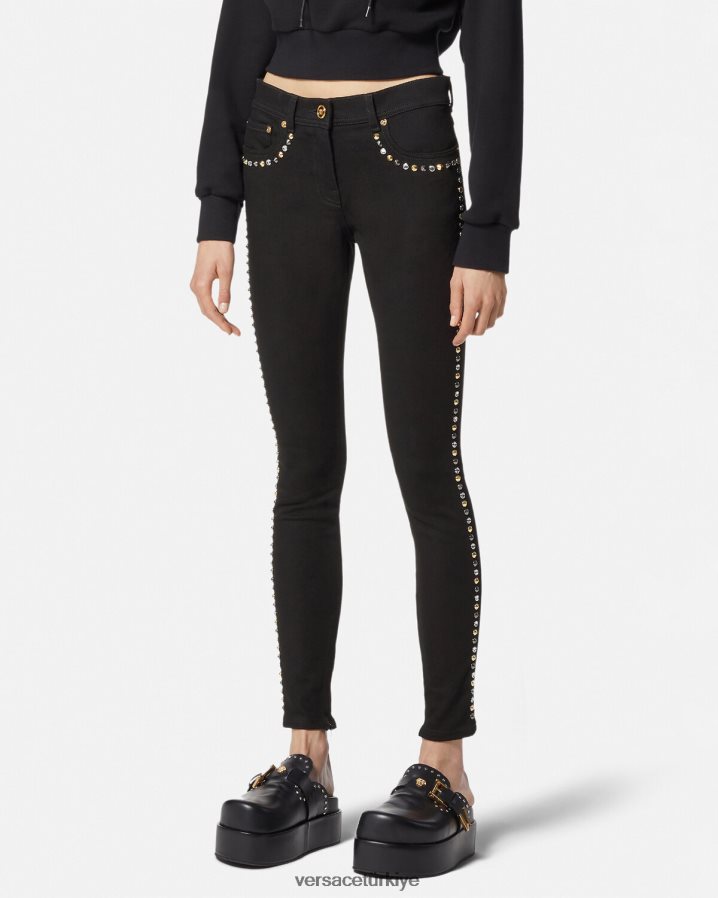 Versace medusa çivili skinny jean pantolon kadınlar siyah Giyim B0HHR8214